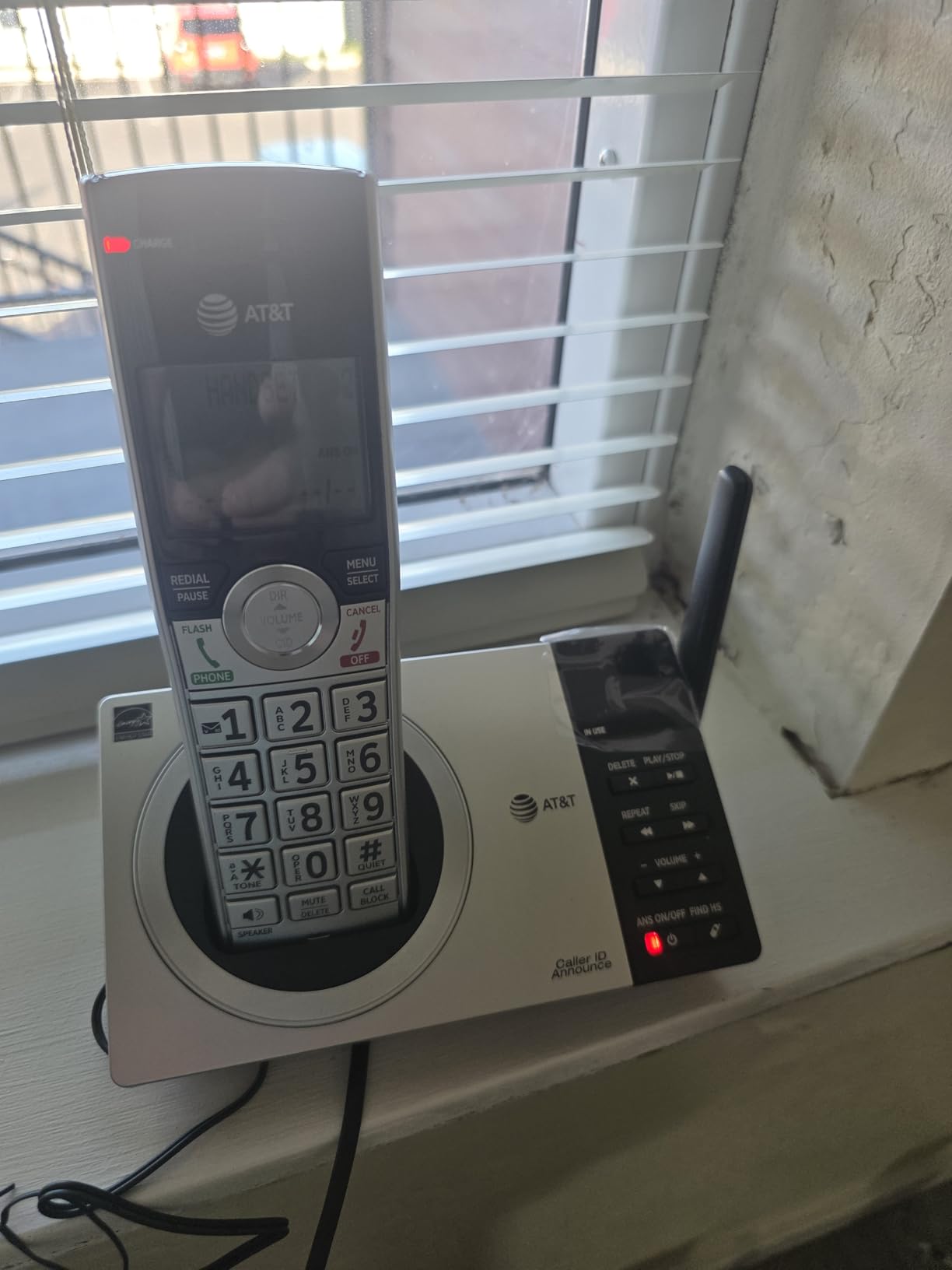 AT&T CL82407 DECT 6.0 4-Handset Cordless Phone with Smart Call Blocker, Answering Machine, Caller ID Announce, Long Range, Expandable, Silver/Black customer photo 1