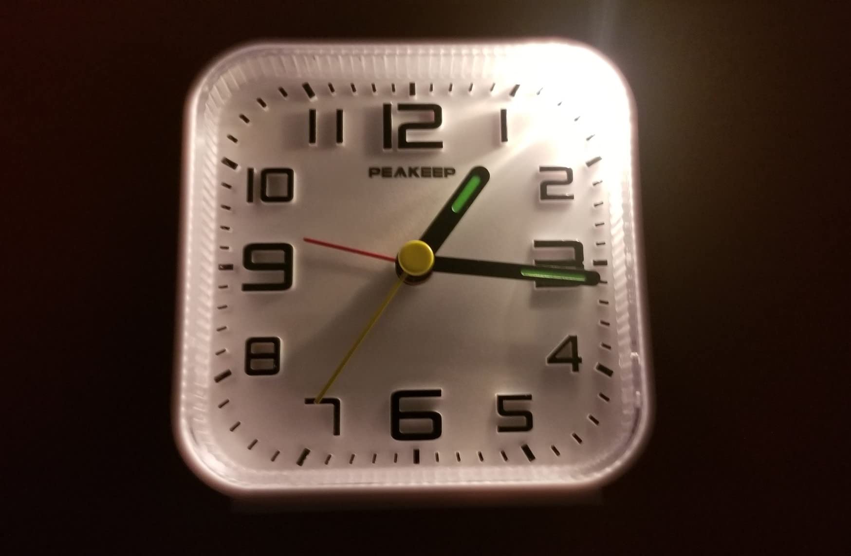 Peakeep Small Battery Operated Analog Travel Alarm Clock Silent | No Ticking, Lighted on Demand and Snooze, Beep Sounds, Gentle Wake, Ascending Alarm, Easy Set (Black) customer photo 2