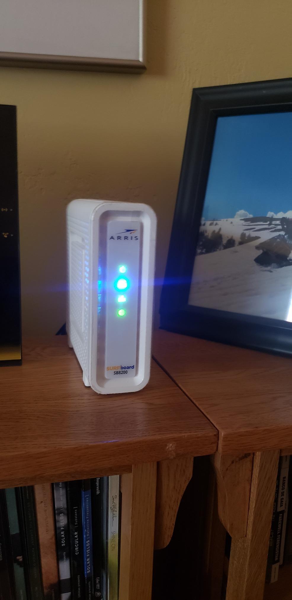 ARRIS SURFboard SB8200 DOCSIS 3.1 Cable Modem | Up to 1 Gbps Plans | Two 1 GbE ports deliver up to 2 Gbps wired aggregate; works with Xfinity, Cox, Spectrum; modem only, router required. customer photo 1