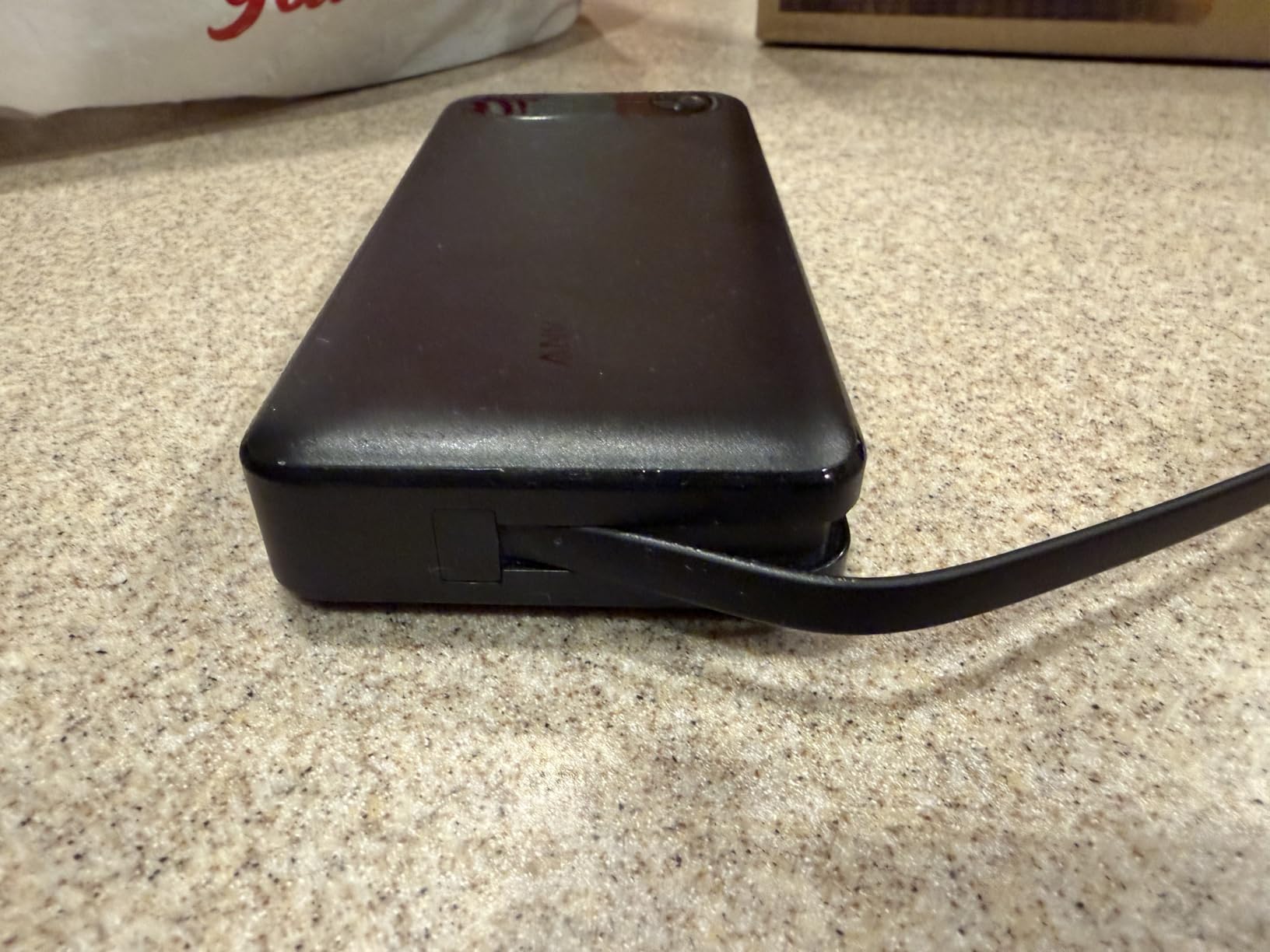 Anker Power Bank, 20,000mAh Travel Essential, Built-in USB-C Cable(Black) | 1 USB-C and 1 USB-A port, for MacBook Pro/Air, iPhone 17/16/15/14, Samsung, Switch and more customer photo 1