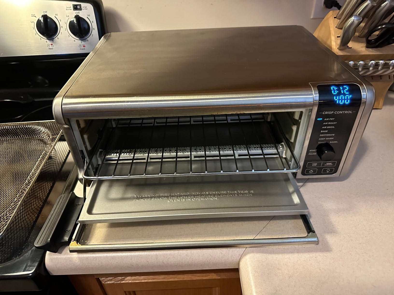 Ninja Flip Toaster Oven & Air Fryer, 8-in-1, Stainless Steel, SP151 | Air fry, bake, broil, toast, bagel, dehydrate, reheat, 1800W, Flip up & away, XL capacity customer photo 1