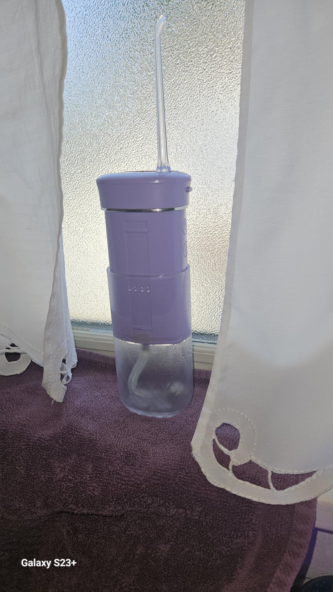 GuruNanda Portable Water Flosser Cordless, Sensitive Gums Friendly | Travel Water Flosser, Collapsible 180mL, 4 Modes, Smart Timer, Built-In Tip Storage, Mini Water Flosser, 30-Days Battery, Lavender customer photo 1