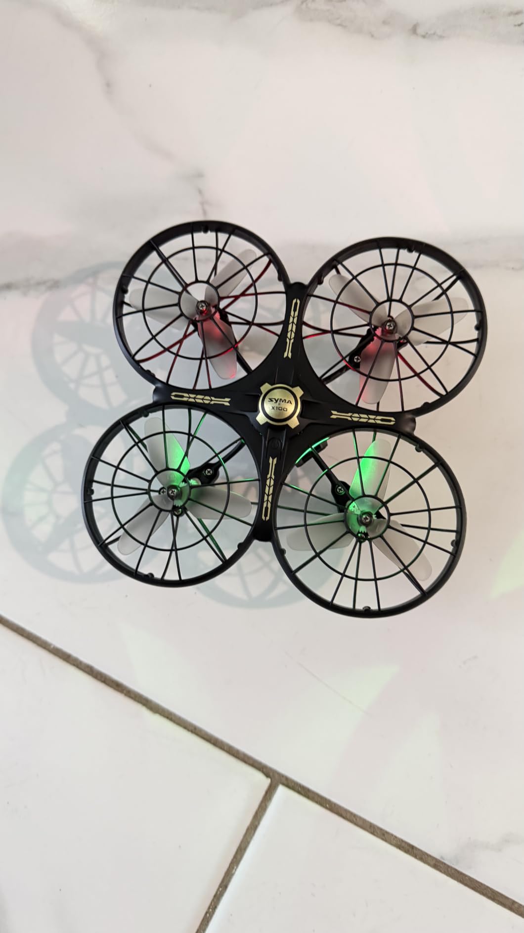 SYMA X100 Indoor Drone for Kids 8-12, Obstacle Avoidance, Full Guard | 20-Min Flight with 2 Batteries, One-key 360° Flips, Altitude Hold and Full Propeller Guard for Safe Indoor Flying customer photo 1
