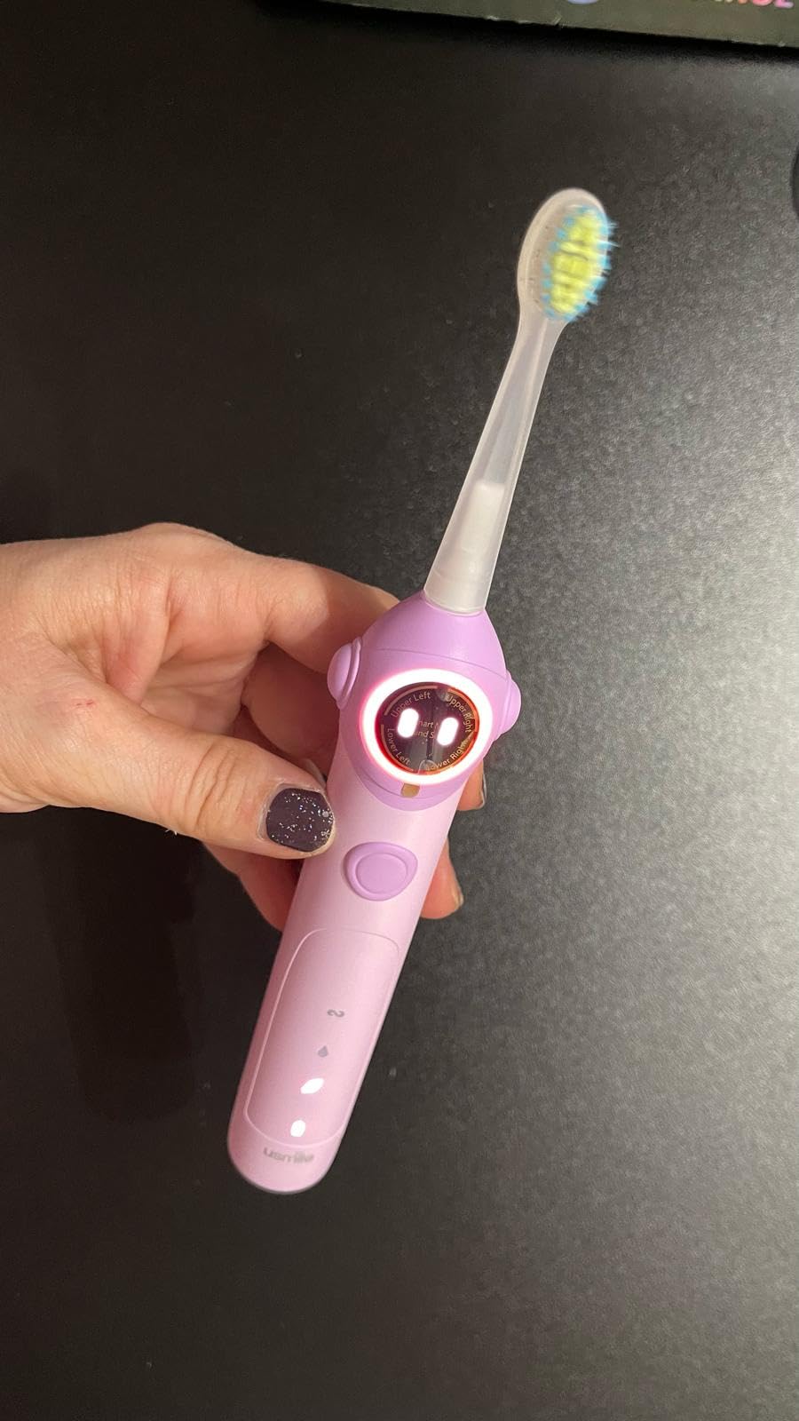 usmile Q30 Kids Smart Toothbrush, Voice-Guided Coaching, Ages 3-8 (Purple), Missed Spot Alerts, Parent App Reports, AI Voice Guide, Fun Music Timer, Gentle Bristles, 90-Day Battery Life customer photo 1