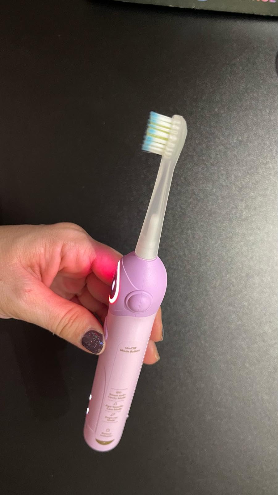 usmile Q30 Kids Smart Toothbrush, Voice-Guided Coaching, Ages 3-8 (Purple), Missed Spot Alerts, Parent App Reports, AI Voice Guide, Fun Music Timer, Gentle Bristles, 90-Day Battery Life customer photo 2
