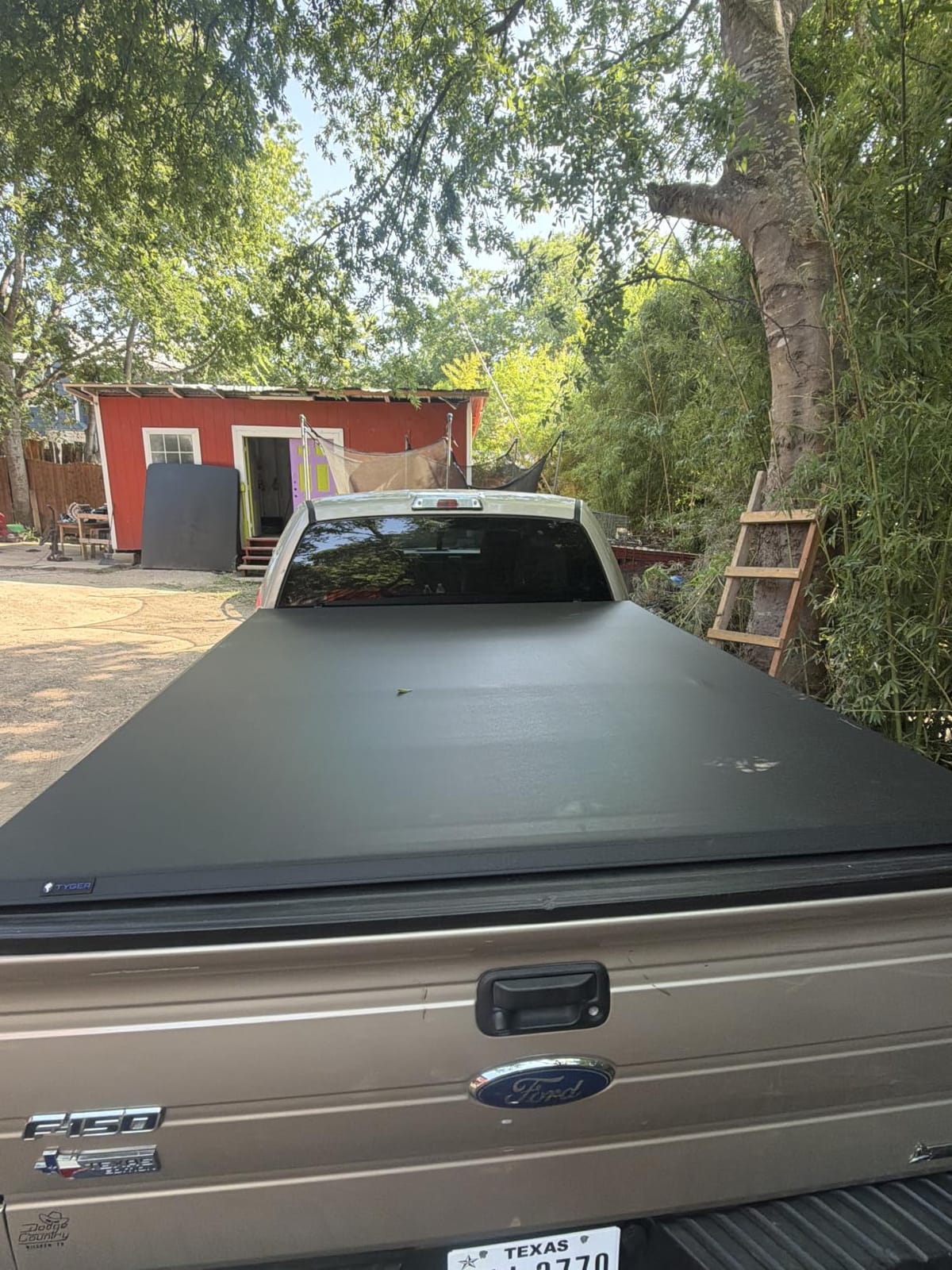 Tyger Auto T3 Soft Tri-fold Truck Bed Tonneau Cover Compatible with 2021-2026 Ford F-150; Lightning | 5.5' (67