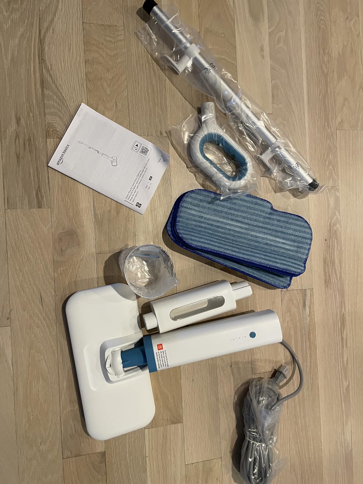 Amazon Basics Steam Mop for All Sealed Hard Floors, Heats Up in 30 Seconds, Chemical-Free Cleaning, 3 Washable Pads, 20-Foot Cord, White customer photo 2