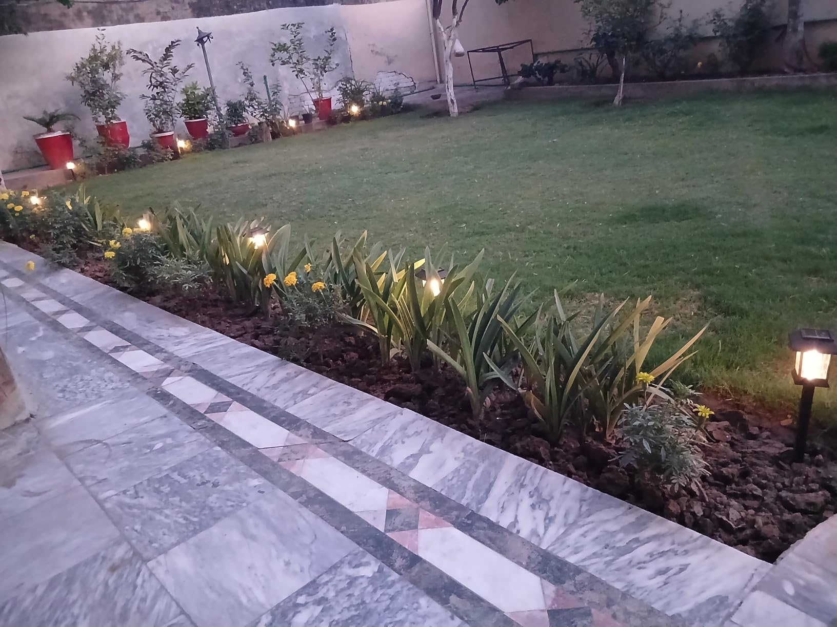 Benany Solar Outdoor Lights, 12 Pack Solar Pathway Lights Waterproof, Landscape Lighting for Path Walkway Lawn Garden Yard Outside Décor, Black customer photo 1